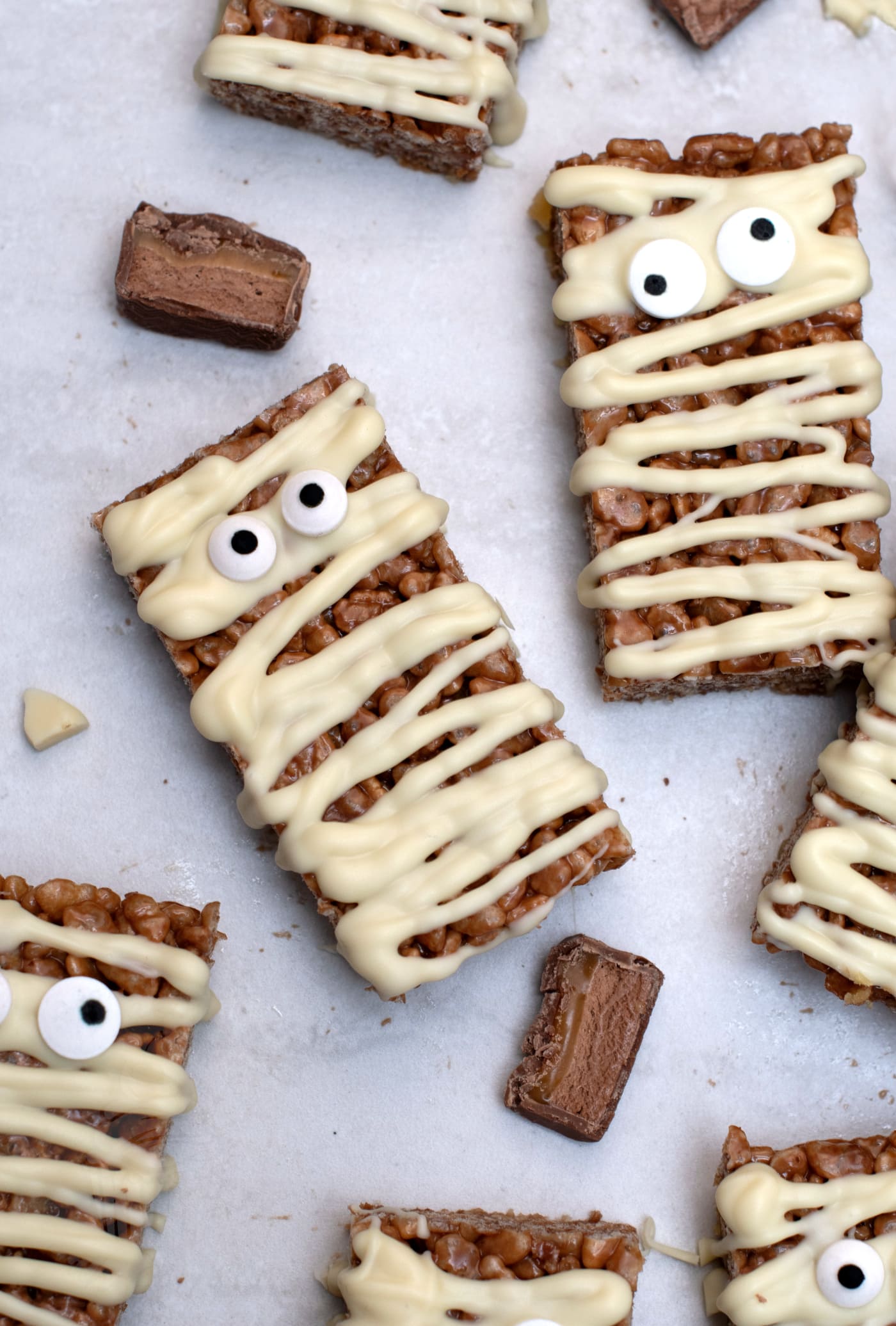 Spooky Mars Bar Slice recipe from Baking with Granny. Easy Mars Bar slice, topped with white chocolate and edible eyes.